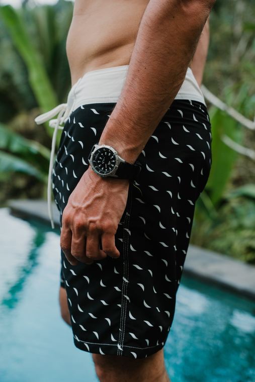 Black Kaiwalu shorts by the pool